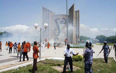 Police spray tear gas at protesters Friday at Togo's Independence Plaza. (ANC Togo)