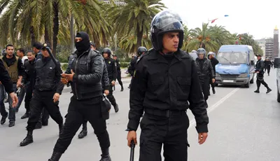 Police attacked journalists and clashed with protesters in a Martyrs' Day demonstration on Monday. (AFP/Fethi Belaid)