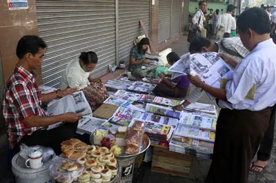 Newspapers on sale in Rangoon. Censorship is so extensive that papers cannot publish more than weekly. (AP/Khin Maung Win)
