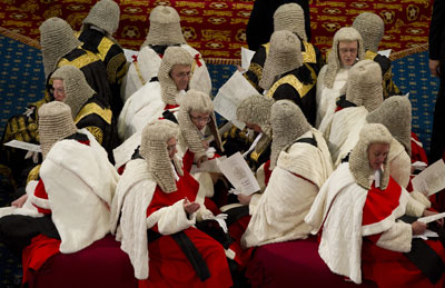 The judicial Law Lords await the Queen's speech to lawmakers in London May 9, when libel reform was part of the government legislative agenda introduced by the monarch. (Reuters/Alastair Grant)