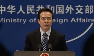 In a press conference today, Ministry of Foreign Affairs Spokesman Hong Lei, above, evaded questions about Al-Jazeera being denied journalist visas. (AP/Andy Wong)