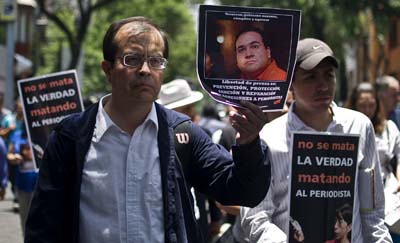 Mexican journalists protest the murders of their colleagues. (AFP/Ronaldo Schemidt)