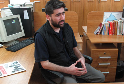 Turkish journalist Adem Özköse, pictured Monday at the Istanbul office of his newspaper Milat, and freelance cameraman Hamit Coşkun were released Saturday from detention in Syria. (AP/Chris Torchia)