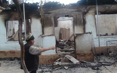 Askarov documented the destruction of people's homes and offices during the ethnic unrest in June 2010. (Azimjon Askarov)