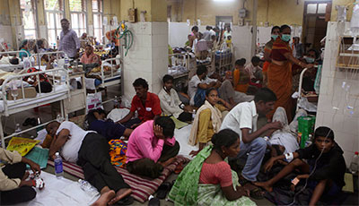 Patients suffering from malaria crowd a ward of a government hospital in India. (AP/Rafiq Maqbool)