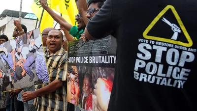 MDP protesters demonstrate outside the Maldivian High Commission in Colombo. (AFP/Lakruwan Wanniarachchi)