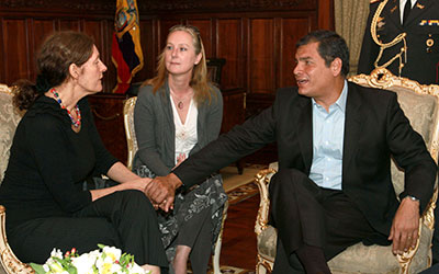 Ecuadoran President Rafael Correa holds the hands of Christine Assange, the mother of WikiLeaks founder Julian Assange, during a meeting in Quito, Ecuador, Aug. 1. (AP/Martin Jaramillo)