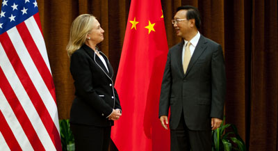 Chinese Foreign Minister Yang Jieche greets U.S. Secretary of State Hillary Clinton in Beijing. (AFP/Jim Watson)