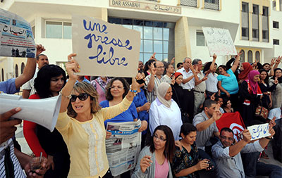 Tunisian journalists from Assabah call for more freedom at a protest in Tunis on September 11, 2012. (AFP/Khalil)