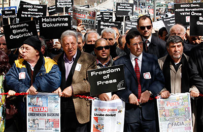 Journalists and activists call for press freedom in Ankara on March 19, 2011, after the arrest of 10 journalists as part of investigations into the alleged Ergenekon plot. (Reuters/Umit Bektas)