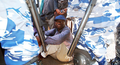 Kizza Besigye (Isaac Kasmani)