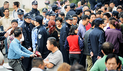 International journalists were obstructed from covering this protest in the city of Ningbo today. (AFP/Peter Parks)