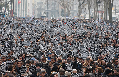 Protesters mark the fifth anniversary of the killing of Turkish-Armenian editor Hrant Dink in Istanbul January 19, 2012. (Reuters/Osman Orsal)