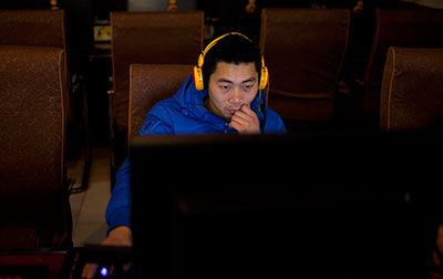 China's new Communist Party leaders are increasing already tight controls on Internet use. (AP/Alexander F. Yuan)