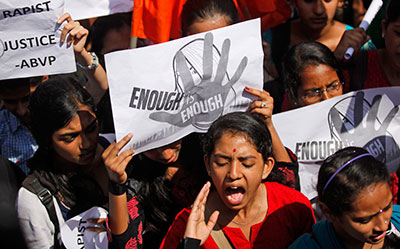 Last month's gang rape of a 23-year-old student provoked debate across India about the routine mistreatment of women and triggered daily protests demanding action. (AP/Aijaz Rahi)