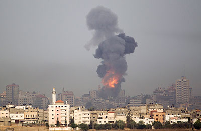Smoke rises following an Israeli airstrike on Gaza on November 17, 2012. (AP/Ariel Schalit)