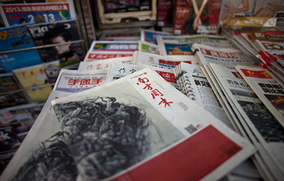 An editorial in the January 3 edition of Southern Weekly was changed from a call for constitutional rule into a tribute praising the Communist Party. (AP/Alexander F. Yuan)