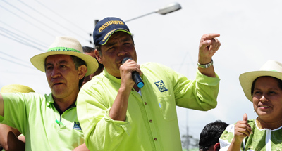 Critics say that Correa, seen here speaking during a campaign rally for the upcoming presidential election, has turned the Ecuadoran press into his whipping boy. (AFP/Rodrigo Buendia)