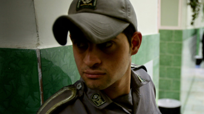 A guard patrols the hallways of Evin Prison. (Reuters/Morteza Nikoubazl)