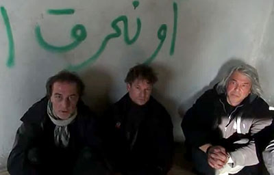 An image grab from a YouTube video uploaded on December 18 allegedly shows NBC employees, from left to right, Aziz Akyavas, Richard Engel, and John Kooistra in captivity in Syria. (AFP/YouTube)