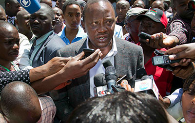 Presidential candidate Uhuru Kenyatta speaks to the press on election day. (AP)