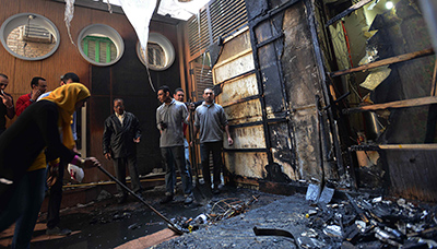 The Al-Watan offices were vandalized and set on fire on Saturday. (AFP/Al-Watan)