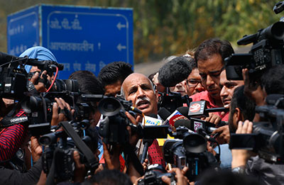 V.K. Anand, lawyer for Ram Singh, a man on trial for the gang rape and killing of a 23-year-old student aboard a New Delhi bus, addresses the media outside a hospital in New Delhi on March 11 after Singh was found dead in prison. (AP/Saurabh Das)
