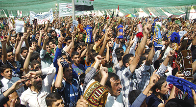 Sunni Muslims chant during an anti-government protest in Samarra. (Reuters/Bakr al-Azzawi)