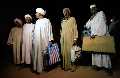 Political prisoners leave Kober Prison in Khartoum on April 2. President Omar Hassan al-Bashir's call to release political prisoners and launch dialogue with the opposition coincided with a return to pre-publication censorship. (Reuters/Mohamed Nureldin Abdallah