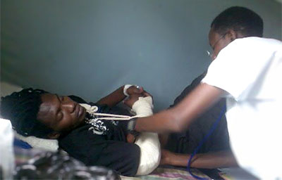 Patrick Paggio Niyonkuru is recovering from a bullet wound to the arm. (Courtesy Patrick Paggio Niyonkuru)