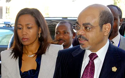 A journalist is being harassed in connection with a seven-month-old story about Azeb Mesfin, seen here with her husband, the late leader Meles Zenawi. (AP/Samson Haileyesus)
