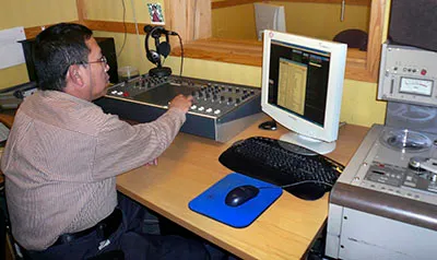 A journalist works the radio booth of the Democratic Voice of Burma, a media outlet run by exiles in Oslo, Norway. The outlet has recently established a bureau in Burma. (Reuters/Wojciech Moskwa)