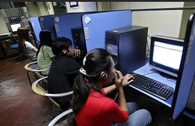 Burmese citizens use an Internet café in Rangoon. The country has one of the lowest Internet penetration rates in the world. (AFP)