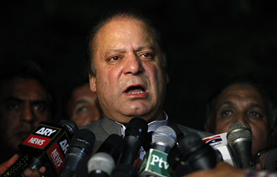 Prime Minister Nawaz Sharif talks to journalists in Lahore. (Reuters/Mohsin Raza)