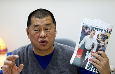 Jimmy Lai's Apple Daily newspaper is known for its outspoken criticism of China. (Reuters/Nicky Loh)