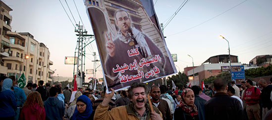 Protesters seek justice for Abou Deif. (AP/Nasser Nasser)