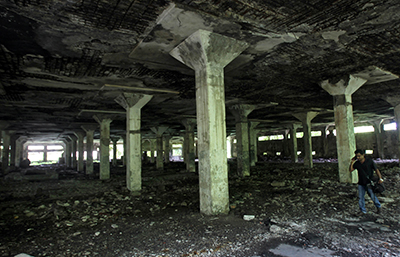 Police say a 22-year-old photographer was raped in this abandoned textile mill. (AP/Rafiq Maqbool)