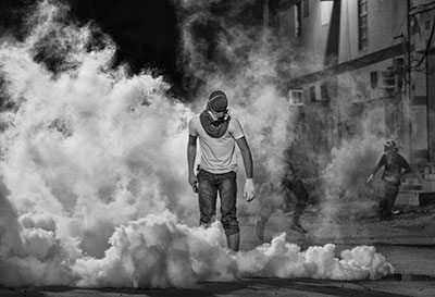 This photo of an anti-government protester by Ahmed Al-Fardan won first place in Freedom House's annual photo contest in April 2013. (Ahmed Al-Fardan)