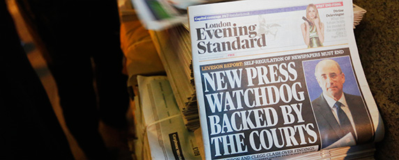 The News of the World scandal, in which the British Sunday tabloid hacked voicemails of celebrities and ordinary citizens, led to a divisive debate on how to regulate the media in the U.K. (Reuters/Luke MacGregor)