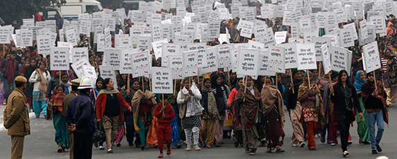 Women march for justice and security in New Delhi on January 2, 2013, following the funeral of a student who died after being gang-raped. (Reuters/Adnan Abidi)