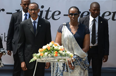 Rwandan President Paul Kagame and First Lady Janet Kagame lay a wreath at a genocide memorial in Kigali on April 7. (AFP/Simon Maina)