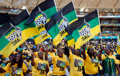 Supporters of President Jacob Zuma's ruling ANC party cheer at their final election rally in Soweto, May 4. South Africans go to the polls on Wednesday. (Reuters/Mike Hutchings)