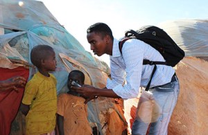 Yusuf Keynan, who was killed by a car bomb in June, is seen here speaking to internally displaced persons. (Abdukhader Ahmed)