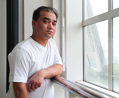 Uighur blogger Ilham Tohti, pictured in Beijing in 2010, has been sentenced to life in prison. (AFP/Frederic J. Brown)