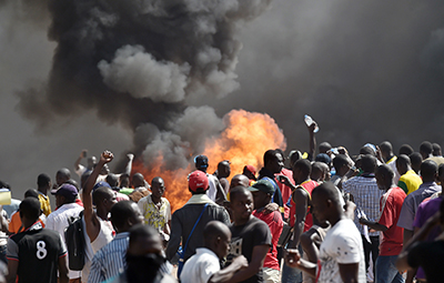 Protesters demonstrate against a proposed amendment to Burkina Faso's constitution that would allow President Blaise Compaore to extend his term. (AFP/Issouf Sanogo)