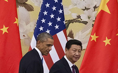 President Xi Jinping, pictured right, with Barack Obama at a Beijing press conference on November 12, where he was questioned about visa restrictions for the foreign press. (AFP/Mandel Ngan)