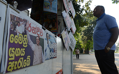 Newspapers announce the election victory of Maithripala Sirisena, who has pledged to improve conditions for the press in Sri Lanka. (AFP/Lakruwan Wanniarachchi)