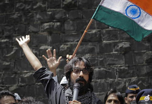 Aseem Trivedi speaks to the media after his arrest in 2012. Charges against the cartoonist have been dropped after India overturned part of its Information Technology Act. (Reuters/Danish Siddiqui)