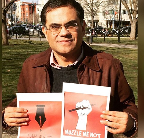 Raza Rumi, pictured in Washington, D.C. in March at a rally for a murdered Bangladeshi blogger, has been living in the U.S. since gunman attacked him last year. (Raza Rumi)