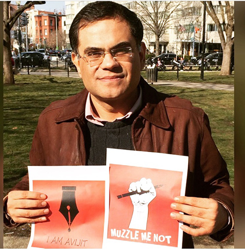Raza Rumi, pictured in Washington, D.C. in March at a rally for a murdered Bangladeshi blogger, has been living in the U.S. since gunman attacked him last year. (Raza Rumi)